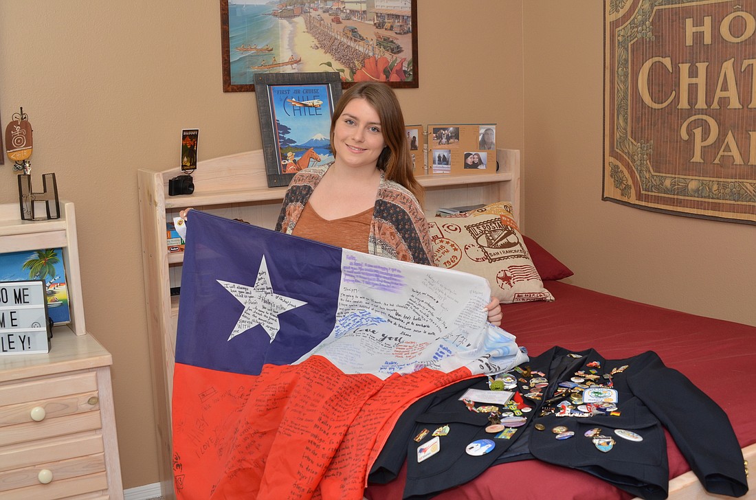 Hailey Weidman brought home many gifts, including a Chilean flag signed by other students in the exchange program.