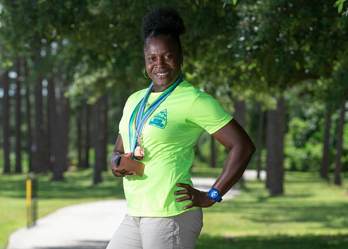 Delloreen Ennis, an Ocoee resident and Orange County recreation specialist, is proud of her accomplishments over her running career. (Courtesy OCFL)