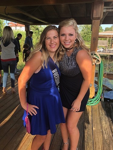 Olivia Andrus, left, and Fall Formal Queen McKenna Griffitts