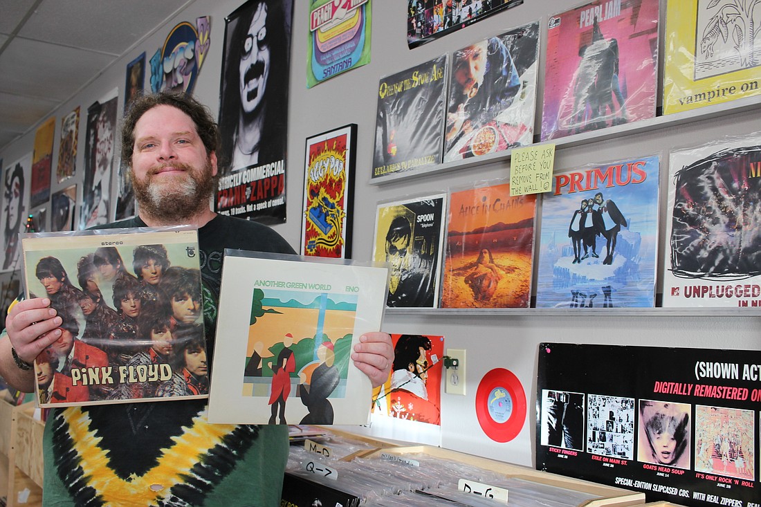 Justin Hall is the owner of Triangle Vinyl in Clermont.