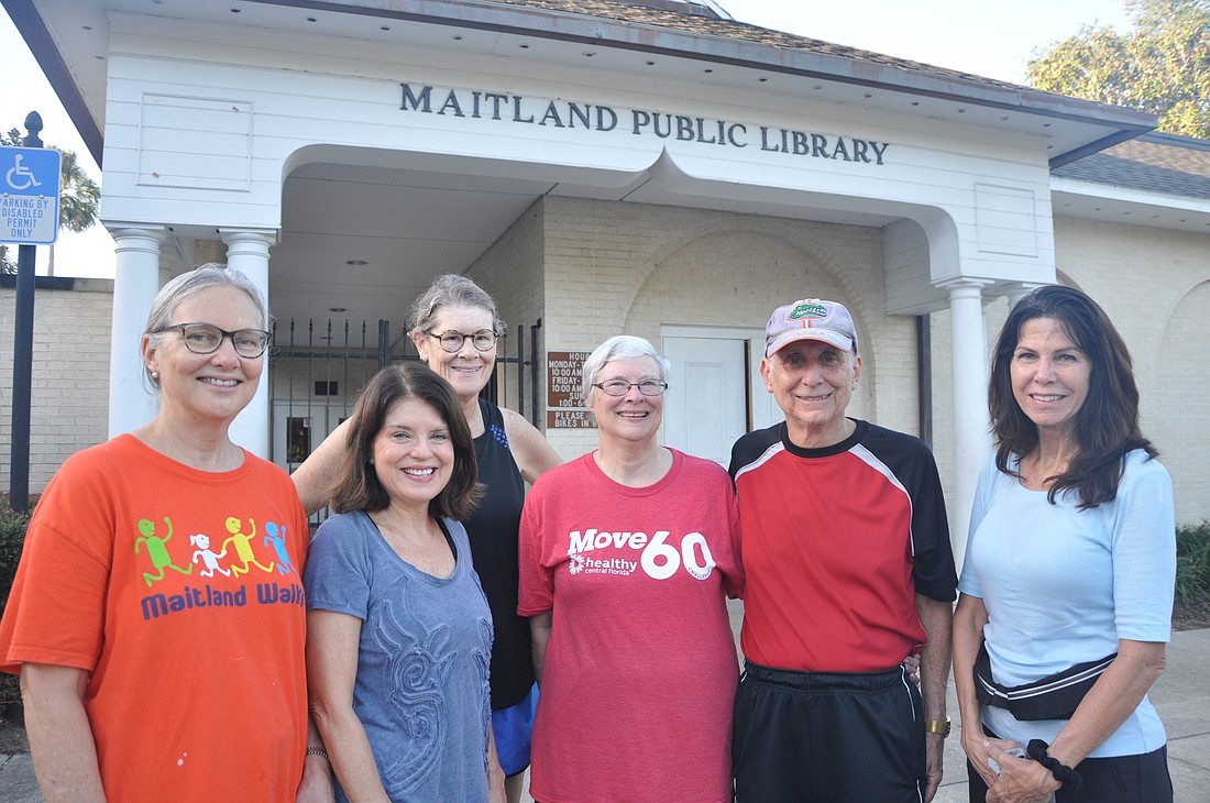 Local walkers start their Thursdays with a trek around Lake Lily and Lake Catherine starting at the Maitland Public Library.