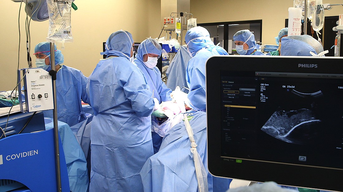 Performing the procedure required a whole team of medical professionals with varying specialities.
