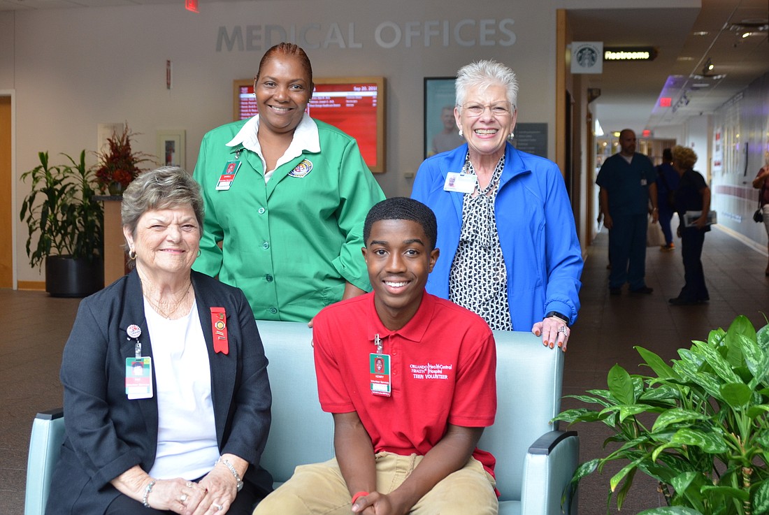 Paulina Wolfe, back right, manages the volunteer program at Health Central. With her are three of the facilityâ€™s many volunteers, Shirell Smith, back left; Pat Harper, front left; and Kenry Severe.