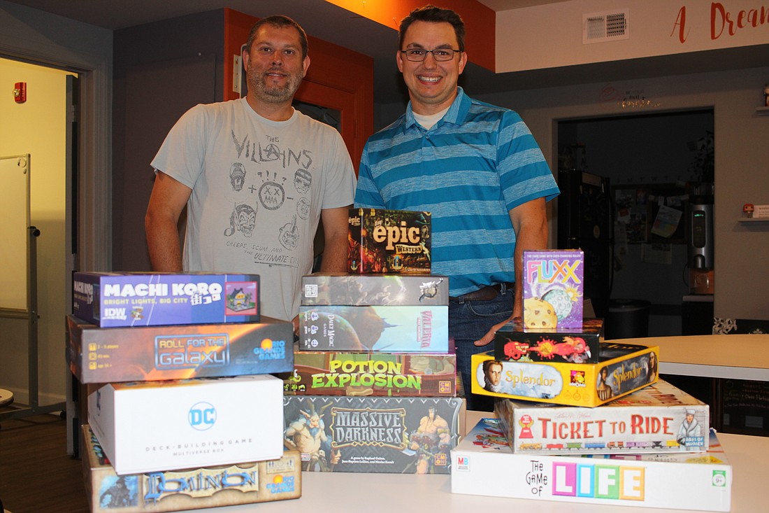 Horizon West Board Game Group co-founders Doug Berry, left, and Andrew Young are excited to welcome new players.