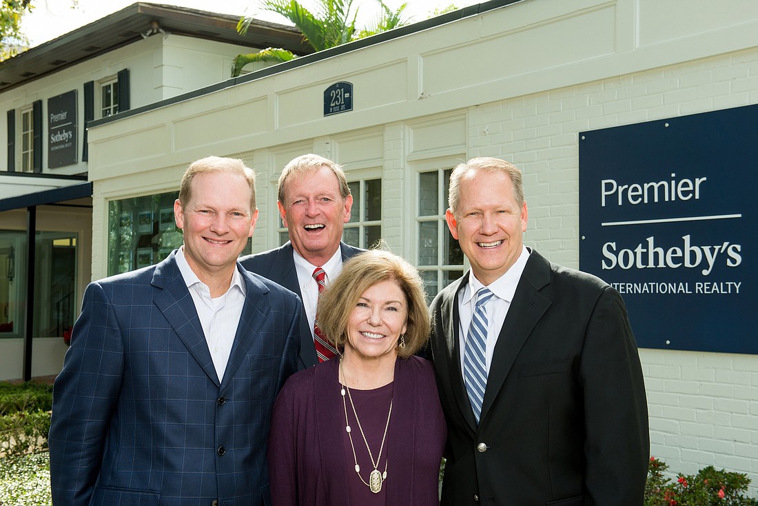 John Pinel, far left, and Mick Night, far right, have joined Danny Williams and Judy Green, center, at Premier Sothebyâ€™s International Realty.
