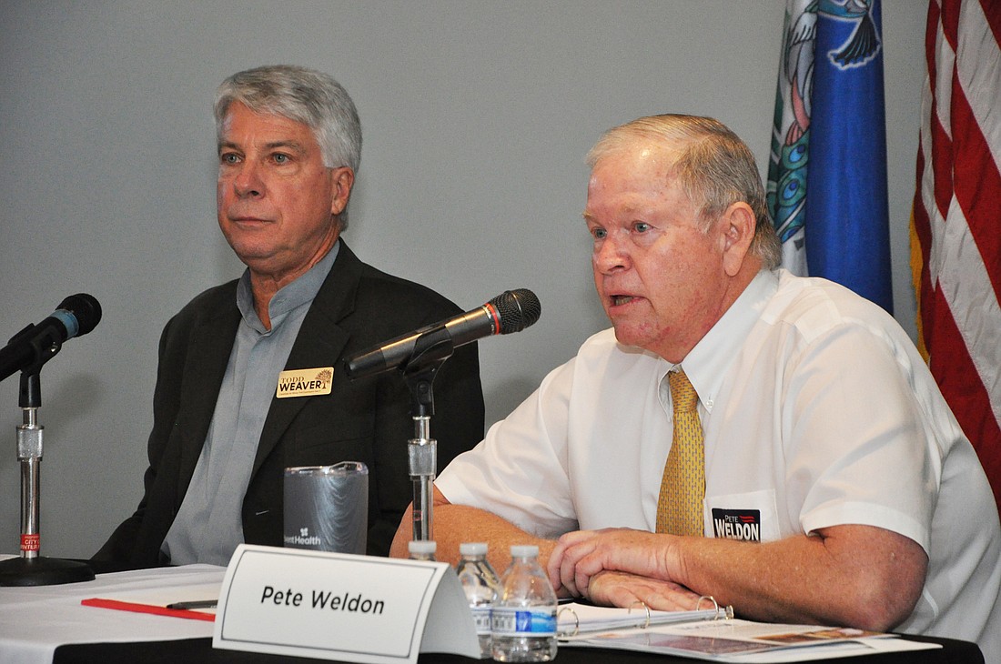Candidates Todd Weaver and Pete Weldon introduced their platforms in their first debate Feb. 8.