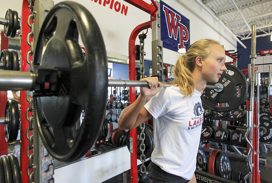 Lyndsey Huizenga works on squats in the Windermere Prep weight room.