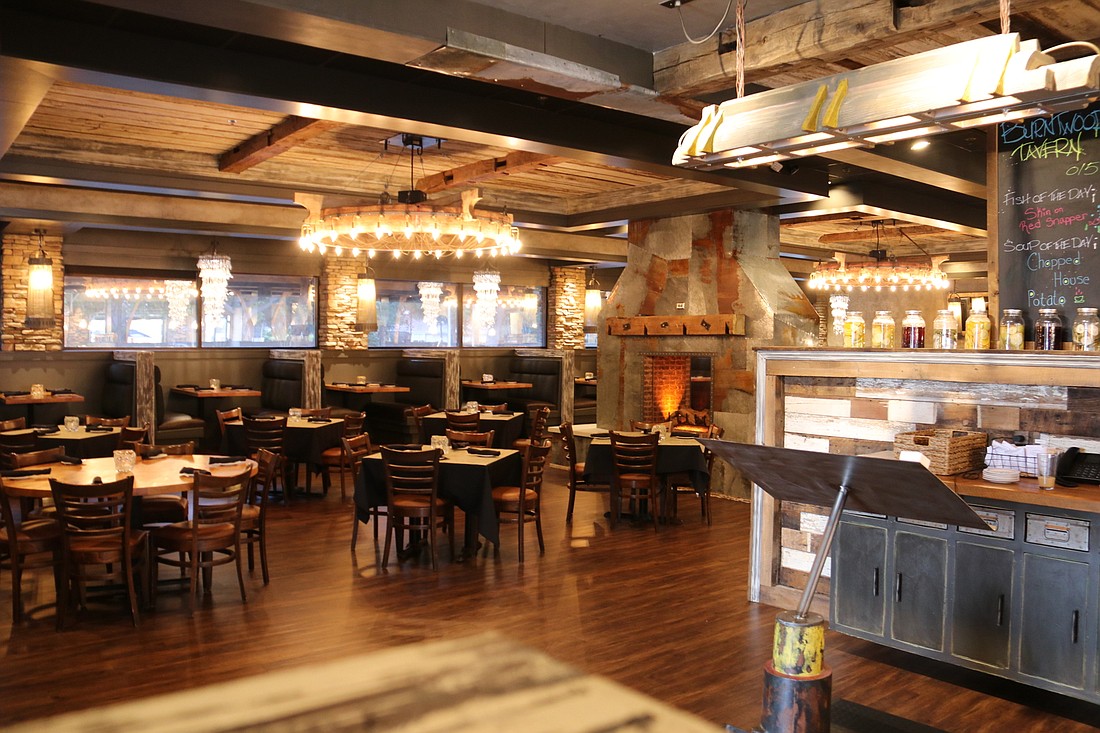 Reclaimed wood and metal trimming throughout give Burntwood Tavern the look of an â€œurban lodge.â€