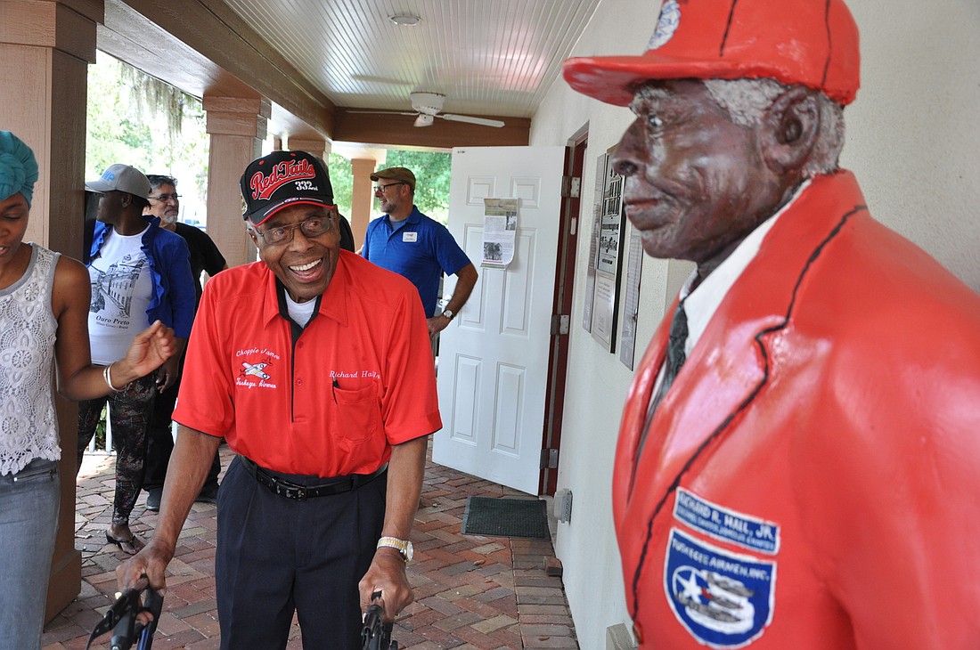 Tuskegee Airman and longtime Winter Park resident Chief Master Sgt. Richard Hall Jr. was thrilled to see the statue repaired.