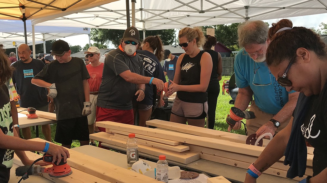 Nearly 300 volunteers gathered in East Winter Garden to take part in the Bunks Across America event on June 15.
