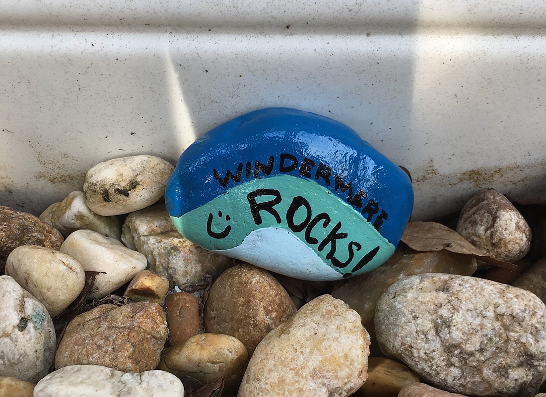 (Courtesy) This rock, painted by Molly Rose, is inspired by the colors of the lakes surrounding Windermere. Rose hopes that others will be inspired and paint their own #WindermereRocks.