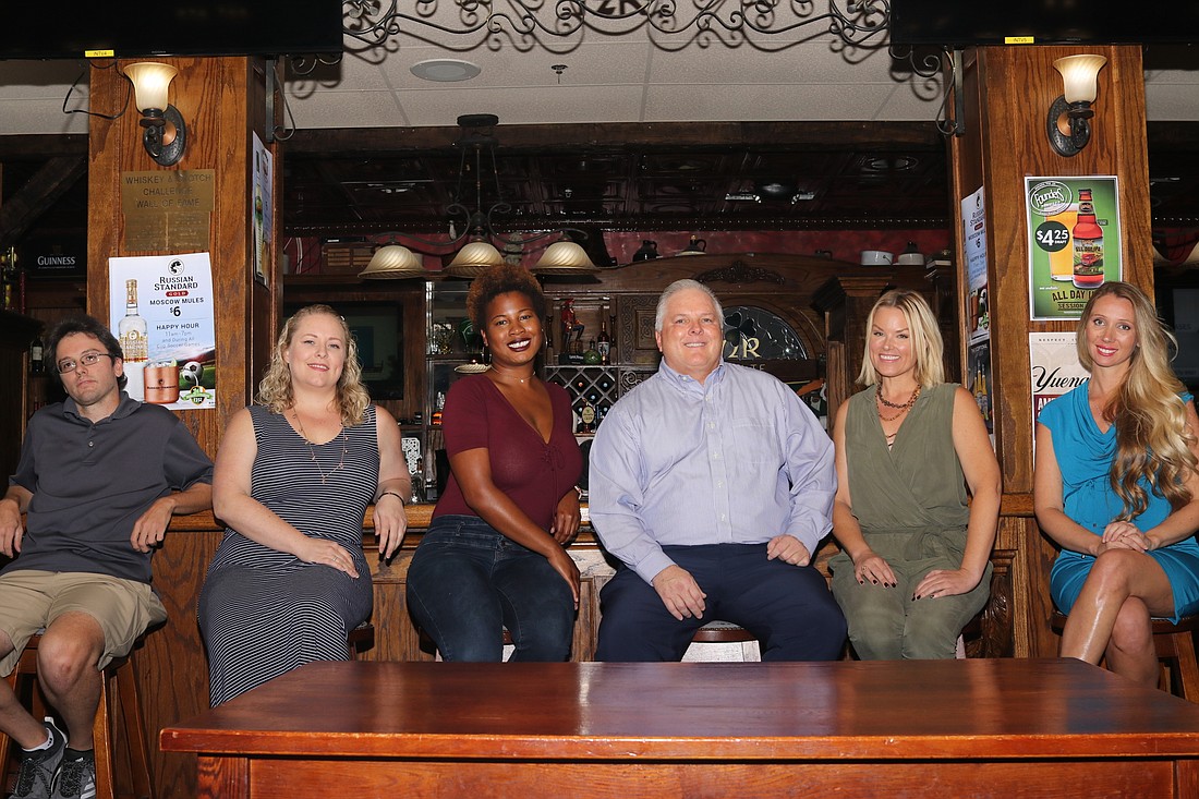 Robert J. Smith, center-right, is joined by some of his crew members from his short film, â€œNEXT!â€ shot in Hagan O&#39;Reilly&#39;s. From left: Scott Fitting, Natalie Maskulak, Brittany Bryant, Smith, Kelly Riese and Varva Haggins.
