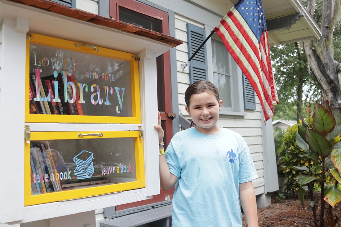 Ten-year-old Loren Williams is the daughter of Windermere Town Council Member Andy Williams, who built the little free library in a manner that mimics how some of the old buildings in the town used to look.