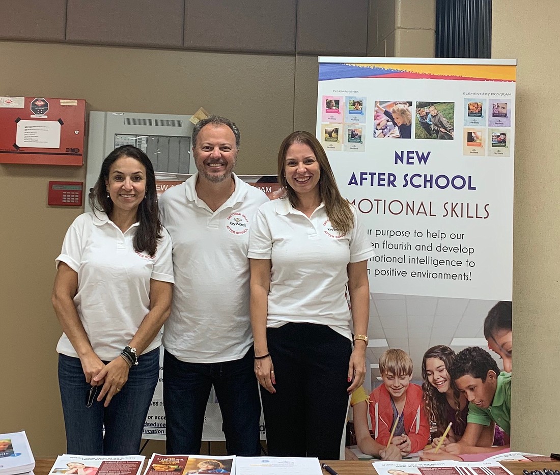 KeyWords Education Executive Director Fabiano Rodrigues, center, and his team are bringing a new after-school program to Sunset Park Elementary.