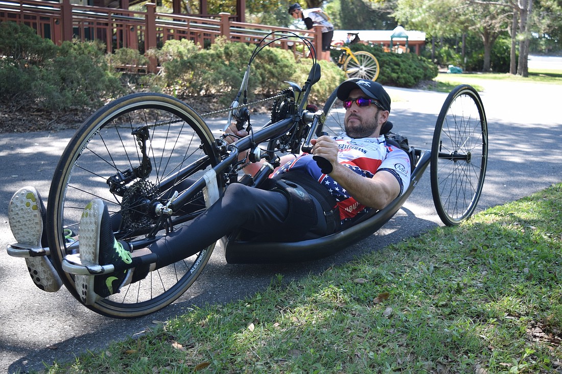 Sean Gibbs races competitively through Paralyzed Veterans of America with his handcycle.