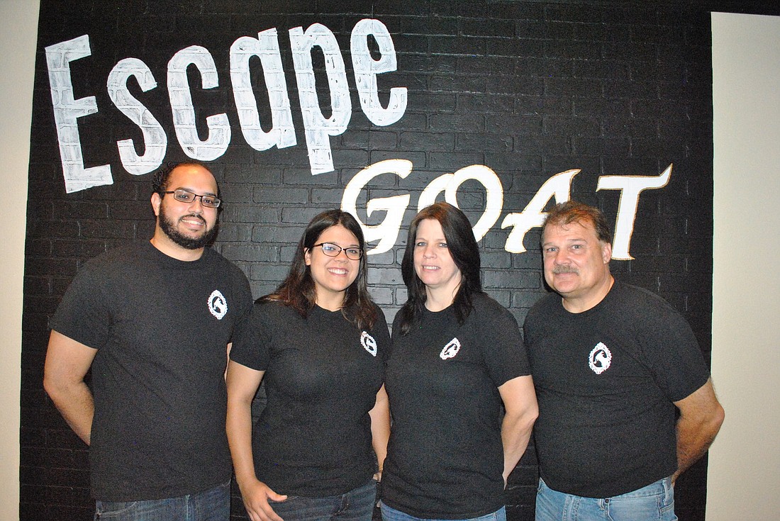 Javier Sepulveda, left, and Breann, Dawn and Dave Aubertin have opened Winter Garden's escape room business, Escape Goat.