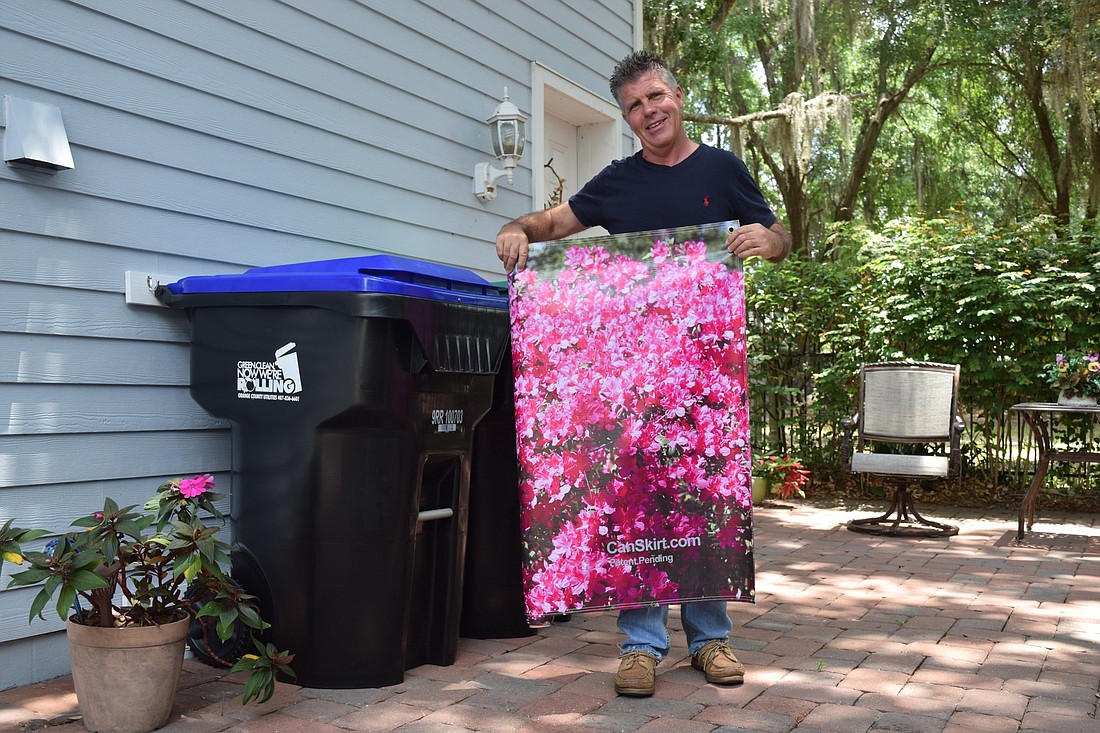 Chris Knowles, CanSkirt inventor, shows off the pink azalea design.