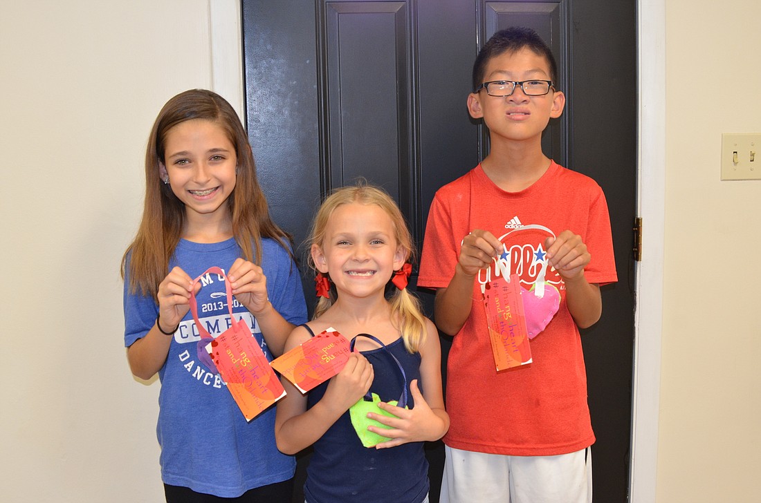 The Salisbury siblings â€” Victoria, Jacquelyn and Gavin â€” are spreading love throughout the community â€” one heart at a time.