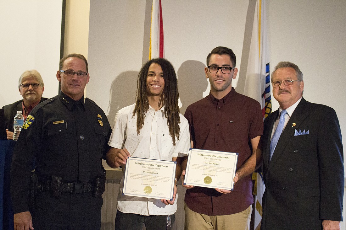 Windermere Town council recognizes Austin Keaton and Joao Pacheco for their heroic actions on Friday, July 8, when they rescued a father and his daughter after their small plane plunged into Lake Down.