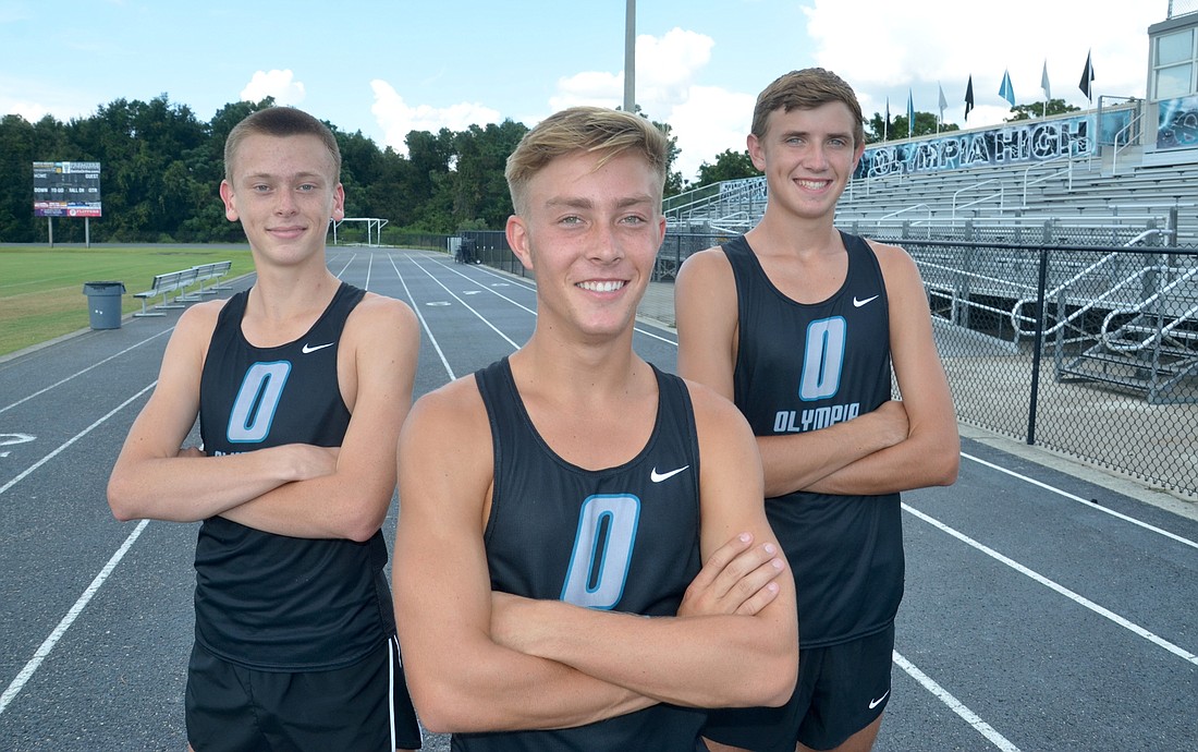 Senior captains Ethan Hood, left, John Hinkle and Jeremy Brinker are excited about how well the Titans have done so far this season.