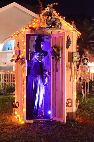Lamar Hodges and Glenda Cockcroft have filled their front yard with Halloween entertainment.