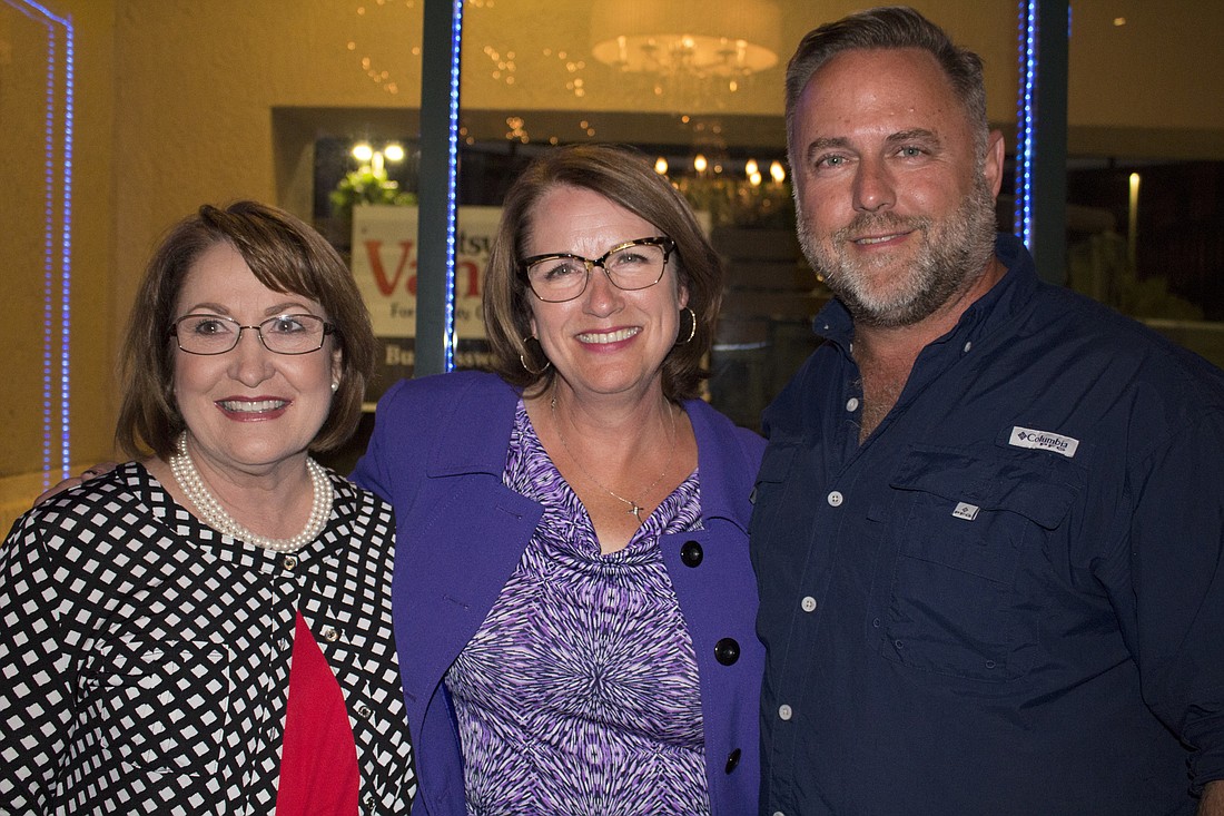 Orange County Mayor Teresa Jacobs, Betsy VanderLey and S. Scott Boyd celebrated VanderLeyâ€™s win at The Vineyard.