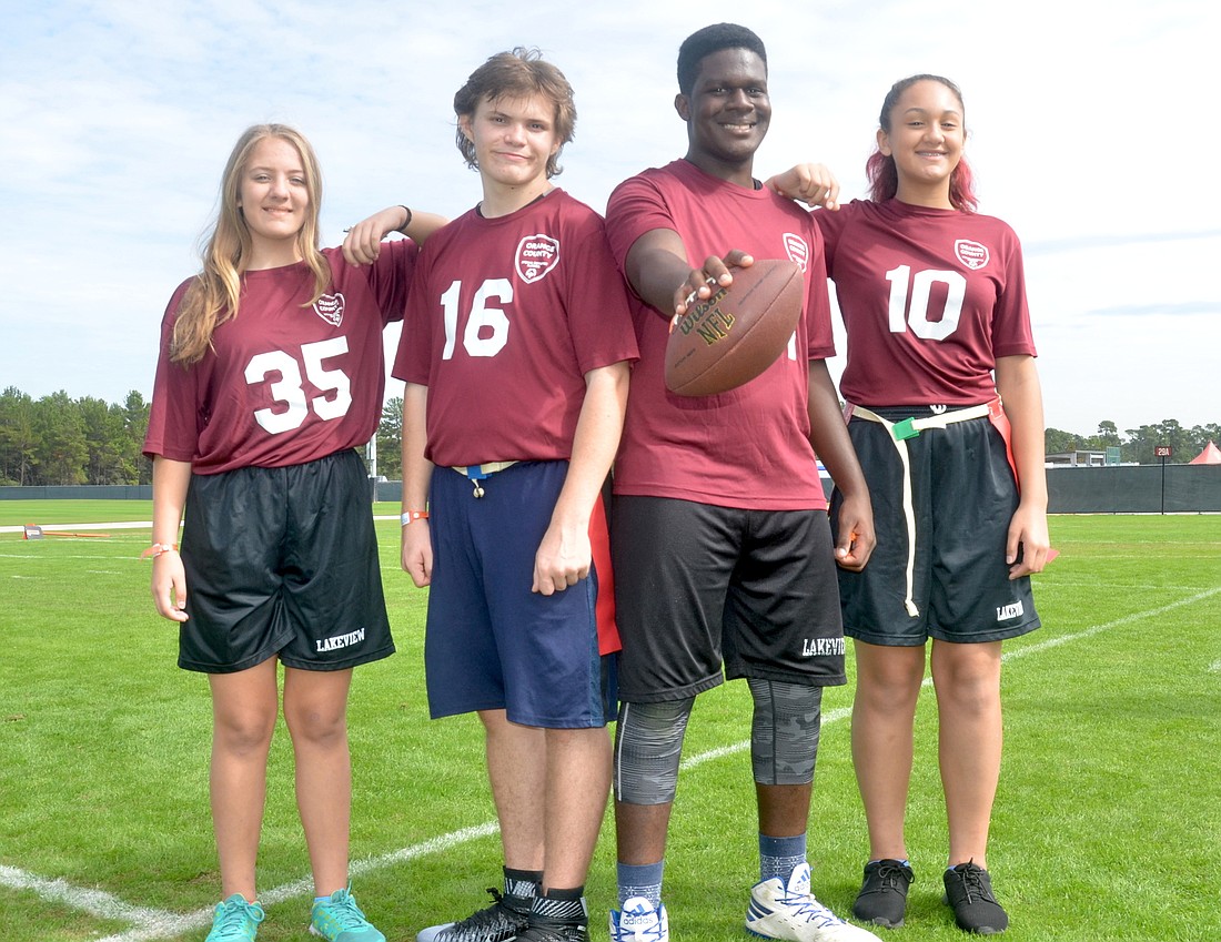 Hannah Sauers, left, Joseph Thames, DeVaughn Clarke and Angelyka Roldan all enjoy competing on the Unified flag-football teams at Lakeview Middle School.