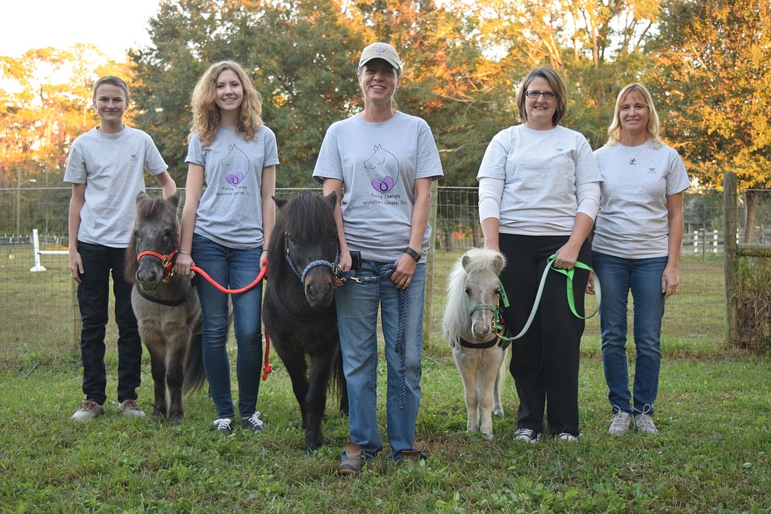 Fuzzy Therapy Miniature Horses, Inc. began with Alicia Dooley and Rommy, center. From left: volunteer Parker LeGros, Bandit, volunteer Megan LeGros, Rommy, Dooley, Rascal, board member Marnie LeGros and board member Bonnie Riley.