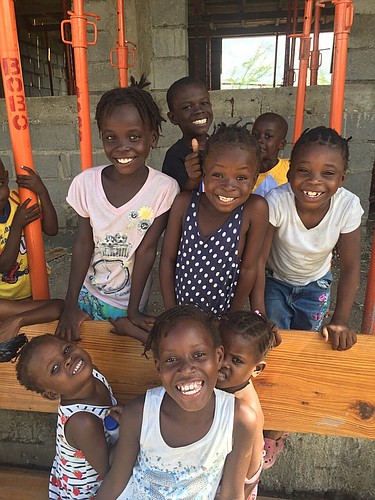 Despite having nothing, these Haitian orphans often are seen happy and smiling.