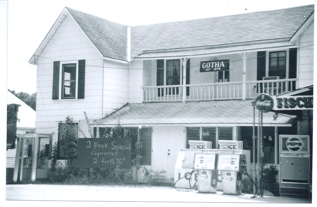 Fischer&#39;   s Country Store in Gotha, 1236 Hempel Ave. The structure was at one time a private residence. Constructed c. 1910. The sign above the front entrance reads Gotha Est. 1879. Gasoline pumps and retail vending items line the front.