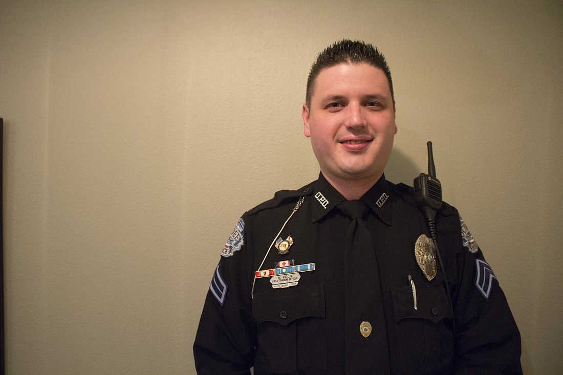 Ocoee police Officer Nathan Coch was given a life-saving award during the Dec. 6 Ocoee commission meeting for his quick thinking that helped his team save a man with multiple gunshot wounds.