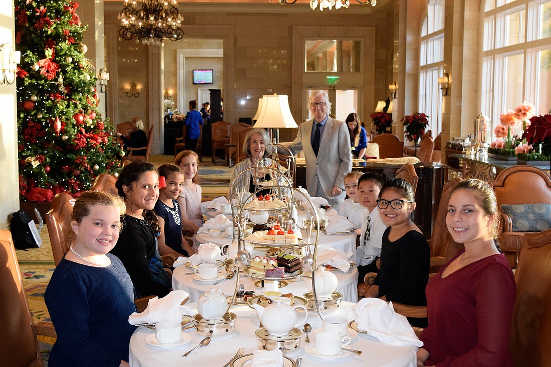 At the end of each six-week course, Vivian and Tony Hunt take their students to an English afternoon tea so the students can showcase their new manners.