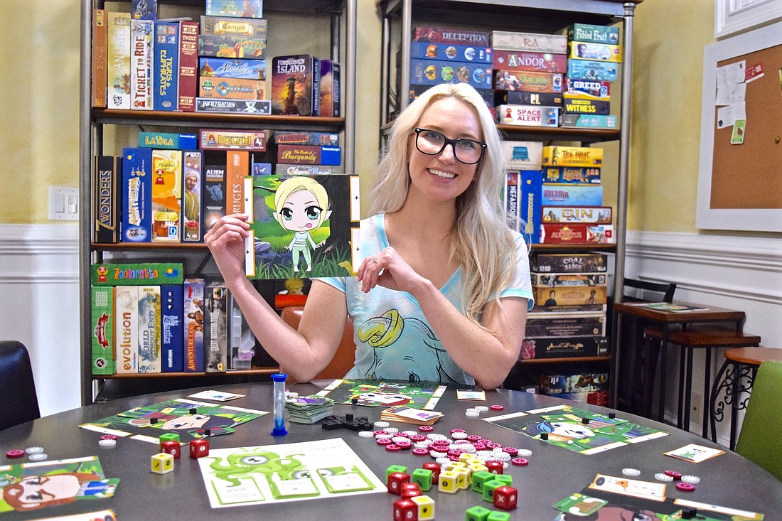 Horizon West resident Kelly North Adams shows off one of the Chibis in her new game, Chibi Quest!
