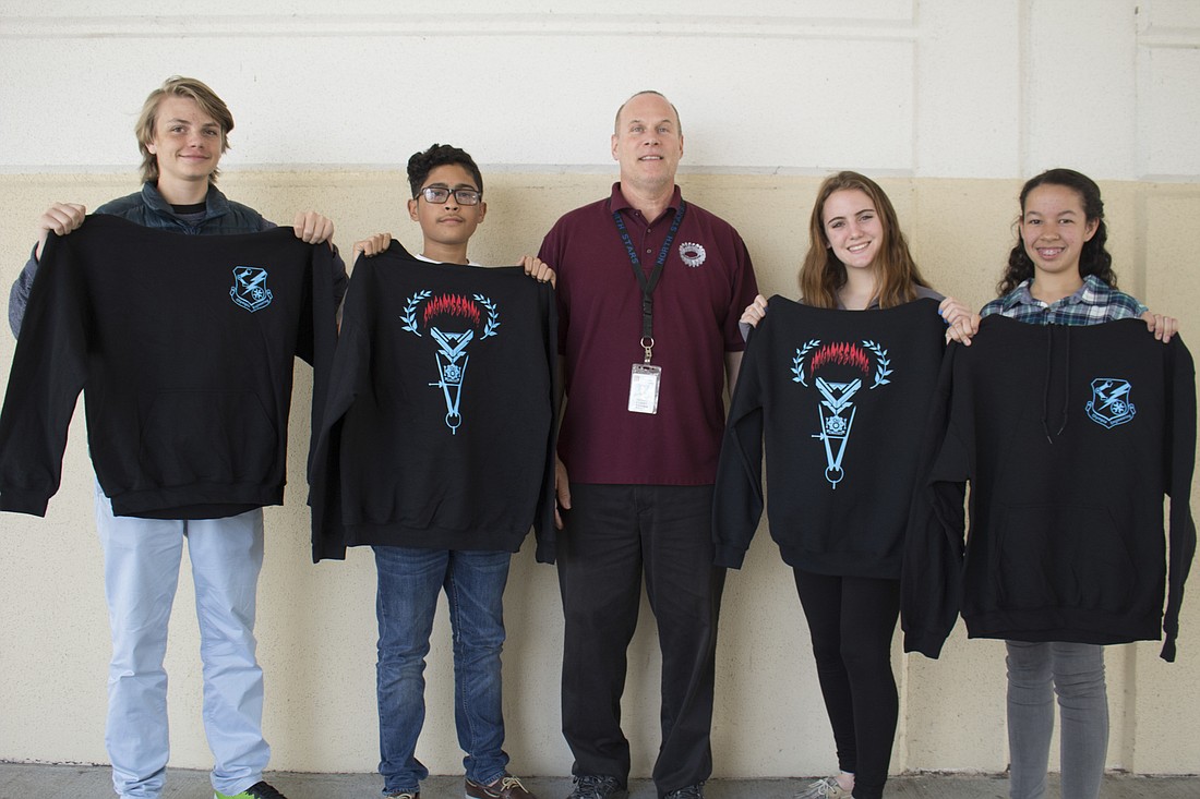 From left: Daniel Petlina, Gilson Castillo, Thomas Corry, Taryn Gilgallon and Shanice Rivera show off the design of the hoodies the club donated to Matthewâ€™s Hope.