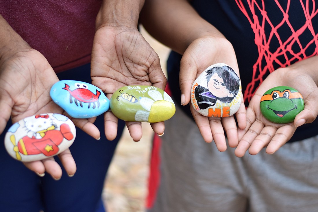 Some of the rocks Bessie and Brandon Gollett have painted include Hello Kitty and a Ninja Turtle.
