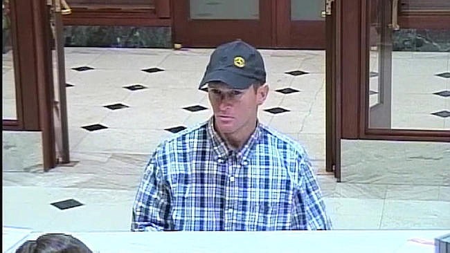 Photo courtesy of Winter Park Police Department - The alleged robber of the SunTrust branch on Park Avenue reportedly struck just as the bank was closing around 5 p.m. on Dec. 30.