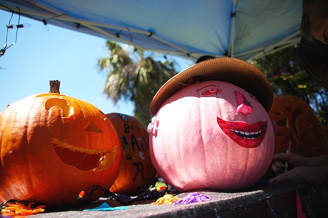 Photo by: Isaac Babcock - Want a safe, child-friendly way to decorate your pumpkin this Halloween? Try drawing a face on your pumpkin and gluing on ribbons and buttons instead.