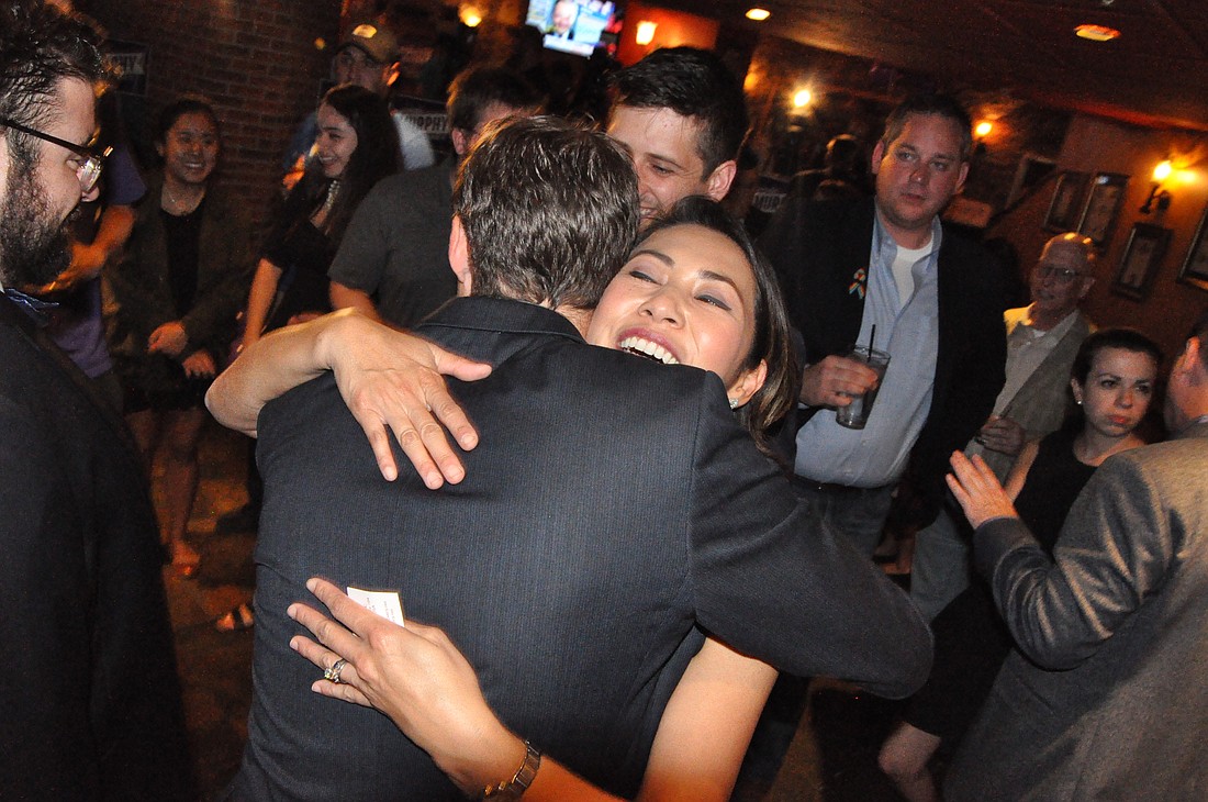 Photo by: Tim Freed - Stephanie Murphy hugs a supporter after winning her election for U.S. Congressional District 7 over 12-term Rep. John Mica.