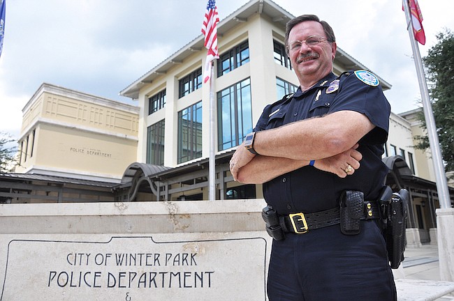 Photo by: Tim Freed - Winter Park Police Chief Brett Railey leaves behind a long career in the city that began at the famous 1981 Winter Park sinkhole.