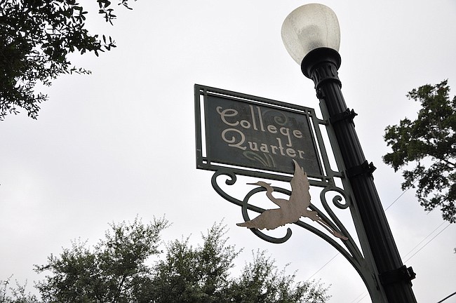 Photo by: Tim Freed - Residents in Winter Park's College Quarter historic district had to fight for approval to install a new black aluminum fence.