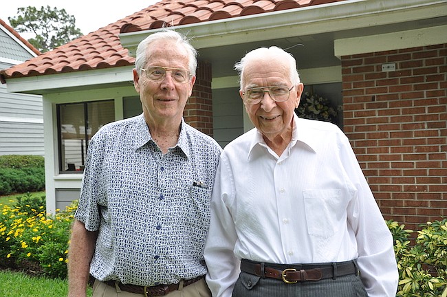Photo by: Tim Freed - Wolf Von Lersner, left, and Ken Shappell, right, are now friends at the Village on the Green senior living community in Longwood. They fought on opposing sides during WWII, in the same battle over a bridge spanning the Rhine Rive...