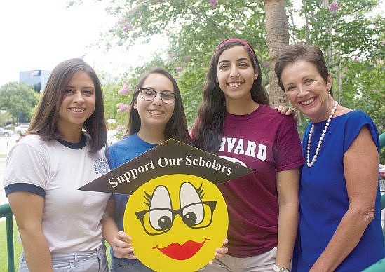 Photo by: Sarah Wilson - College bound students Alicia Cotto, left, Dara Parada, center, and Amanda Gomez were chosen to receive help from Winter Park's Support our Scholars program, founded by Susan Johnson, right.