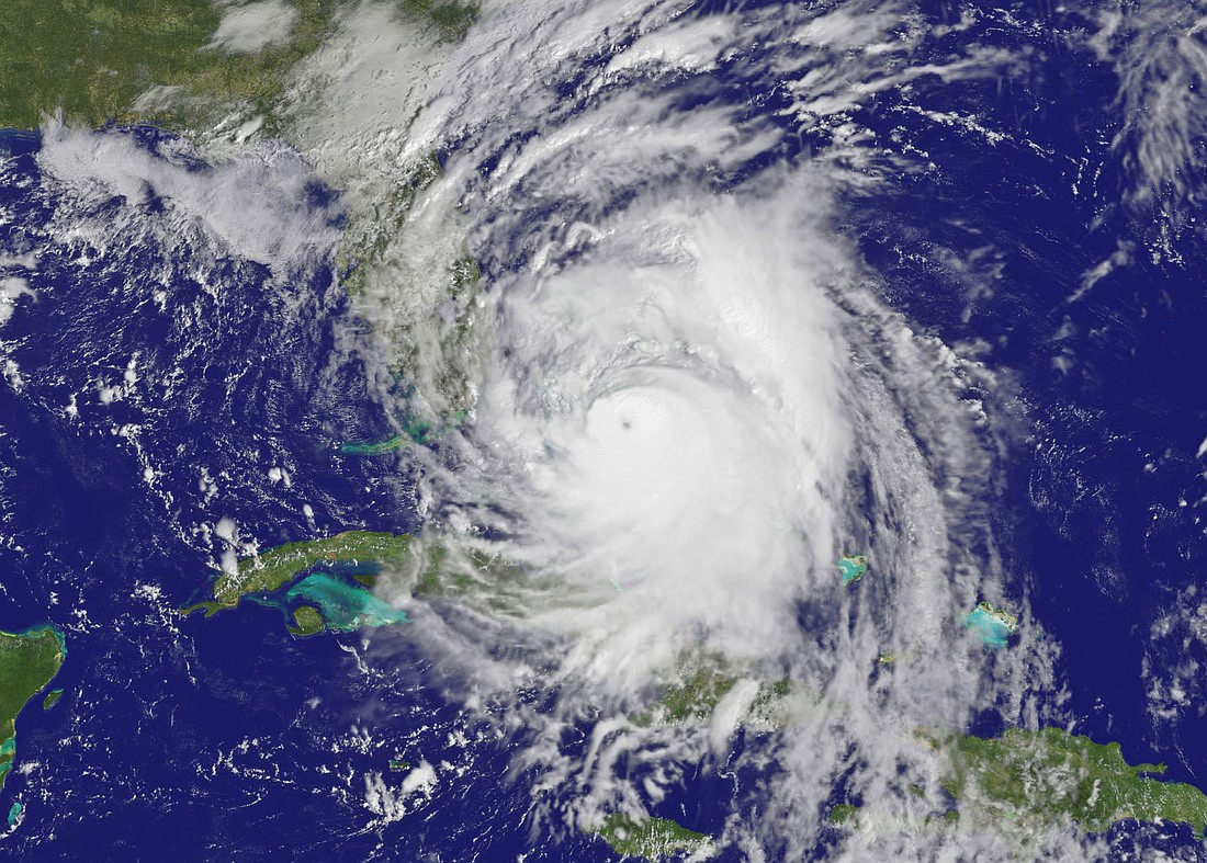 Photo by: NOAA - Hurricane Matthew turns toward Florida Thursday, expected to strengthen to Category 4 strength, possibly Category 5, making it one of the most powerful tropical cyclones to ever hit the state.