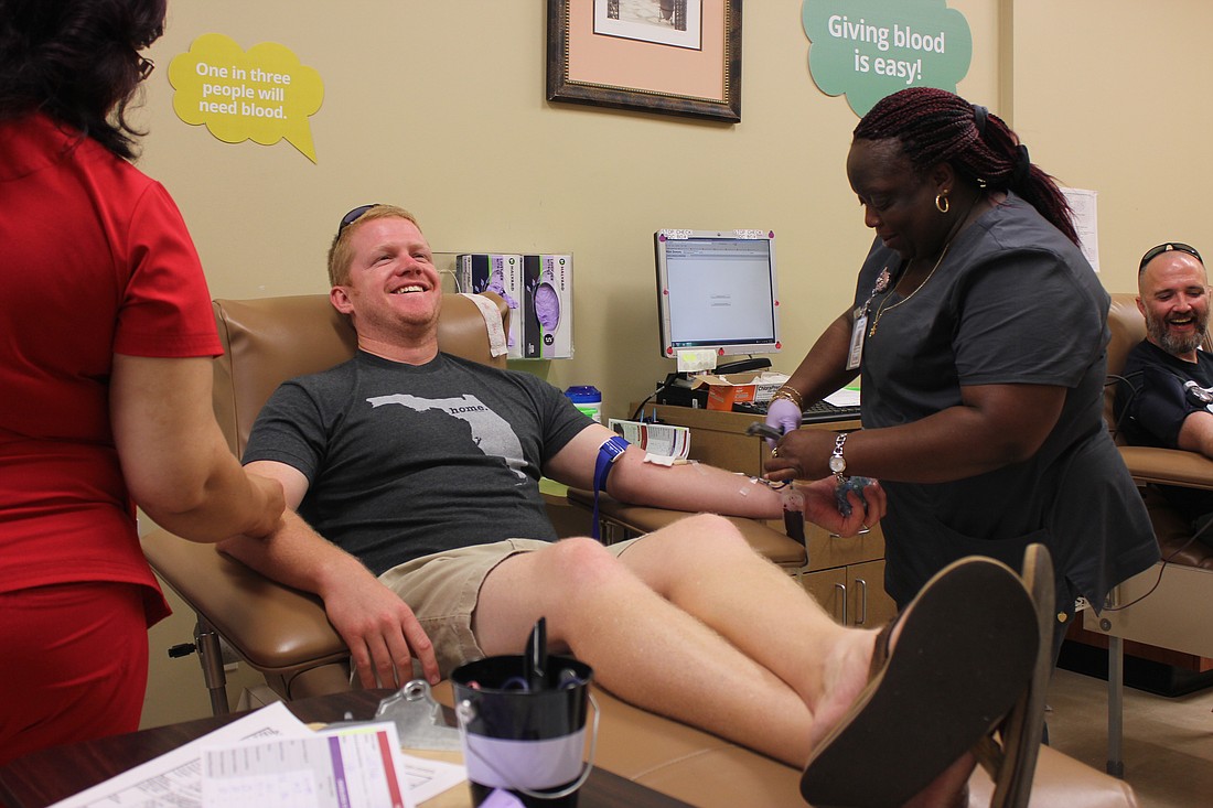Photo by: Sarah Wilson - Donors swarmed Maitland blood donation centers to help resupply local blood banks Monday, in the wake of the deadliest mass shooting in American history.