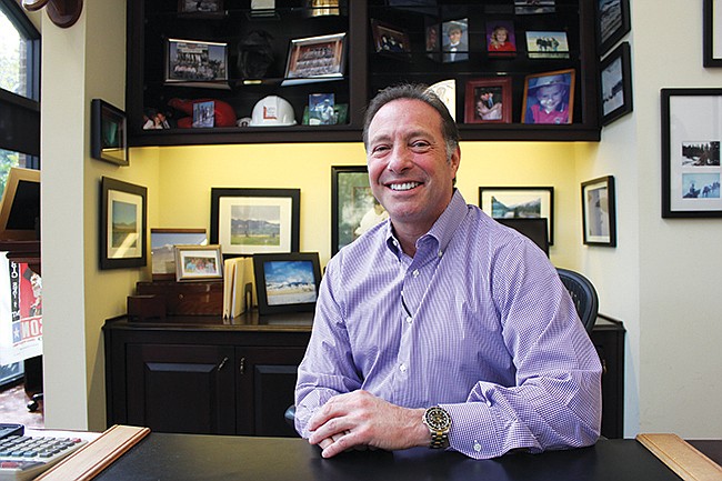 Photo by: Sarah Wilson - David Lamm has helped develop numerous communities across Central Florida, but both he and his company's office call Baldwin Park home. He helped designed his work space from the ground up.