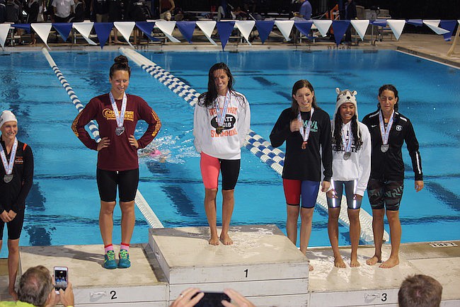 Photo courtesy of Bella English - Winter Park High School Senior Bella English (center at first place) is the Winter Park/Maitland Observer's athlete of the month!