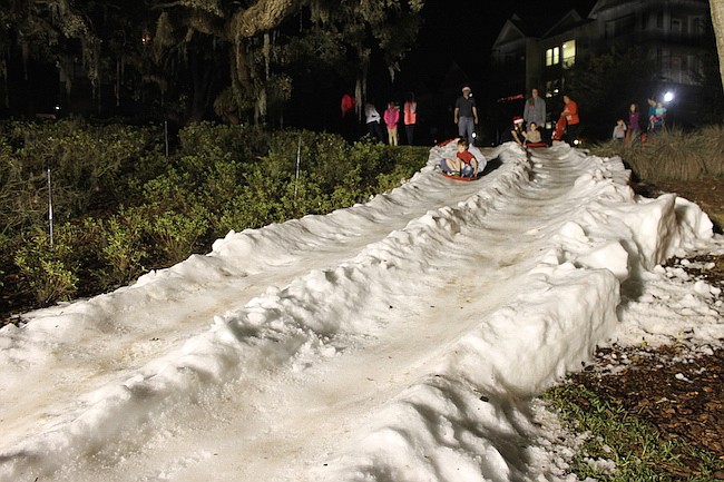 Photo by City of Maitland - The snow slide at Maitland's Season of Light was a hit with kids careening down an icy hill.