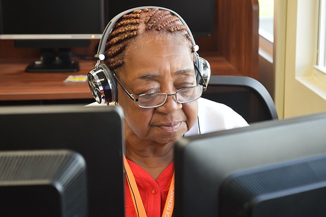 Photo by Paige Wilson - Mary Sneed, 73, practices transcribing medical notes at Orange Technical College as part of her quest to get a college education long after raising her son, Sheldon.