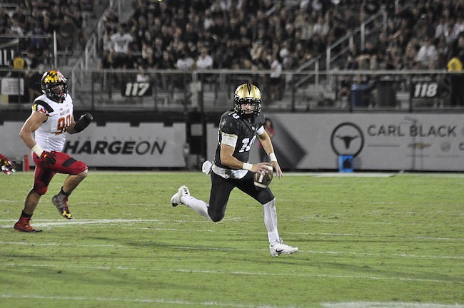 Photo by: Isaac Babcock - Freshman UCF quarterback McKenzie Milton exorcised the demons that plagued the Knights in a double overtime loss against Maryland, avoiding any turnovers in their win over Florida International.