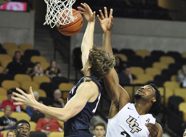 Photo by: Isaac Babcock - The Knights shocked No. 15 Cincinnati with a 53-49 win Sunday.
